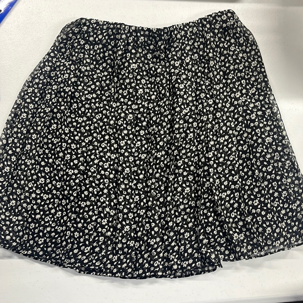 black flowy mini skirt